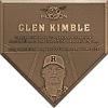 A baseball coach 500th win bronze plaque in the shape of a home plate